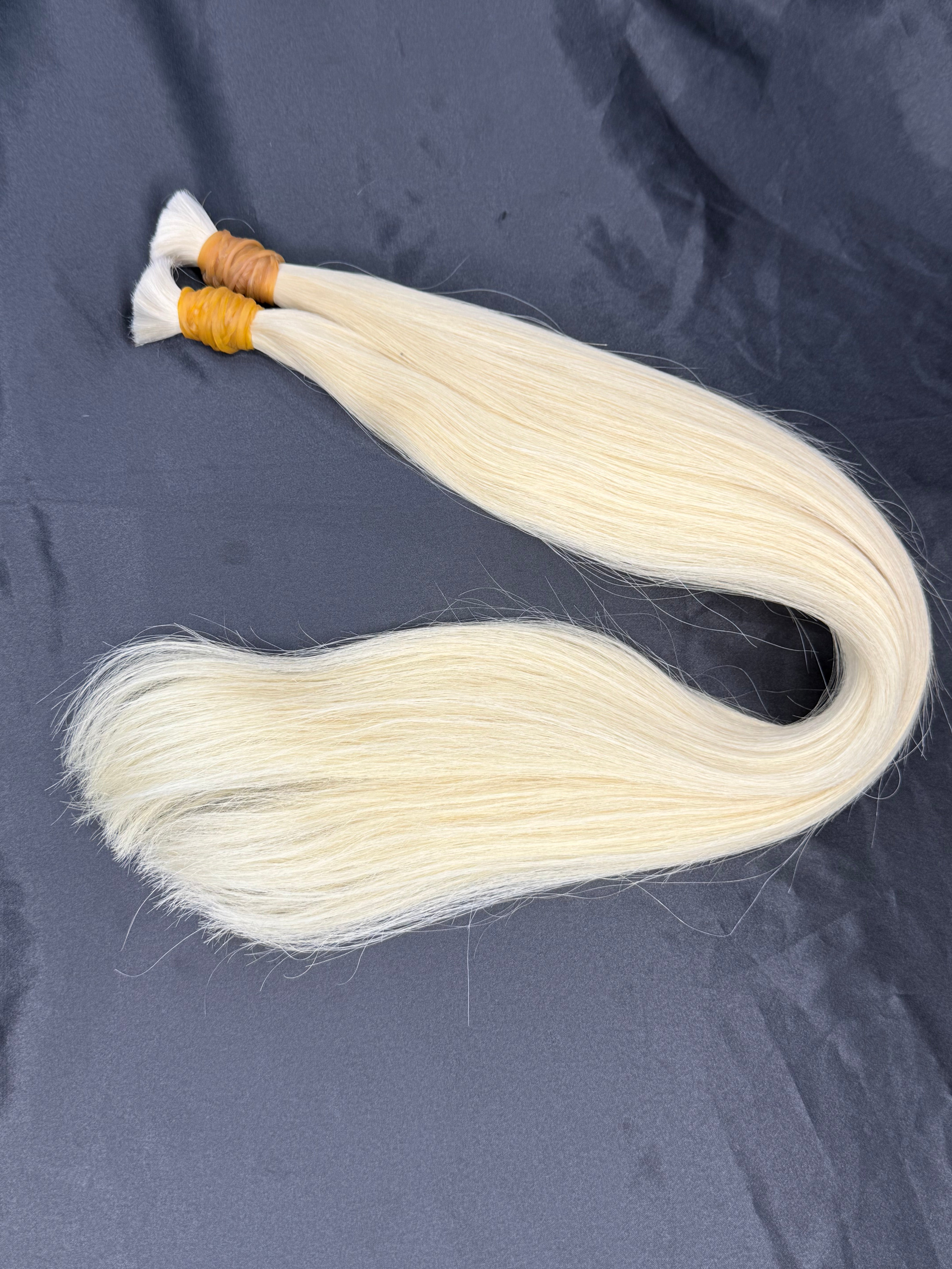 Ice blonde Weft hair extension