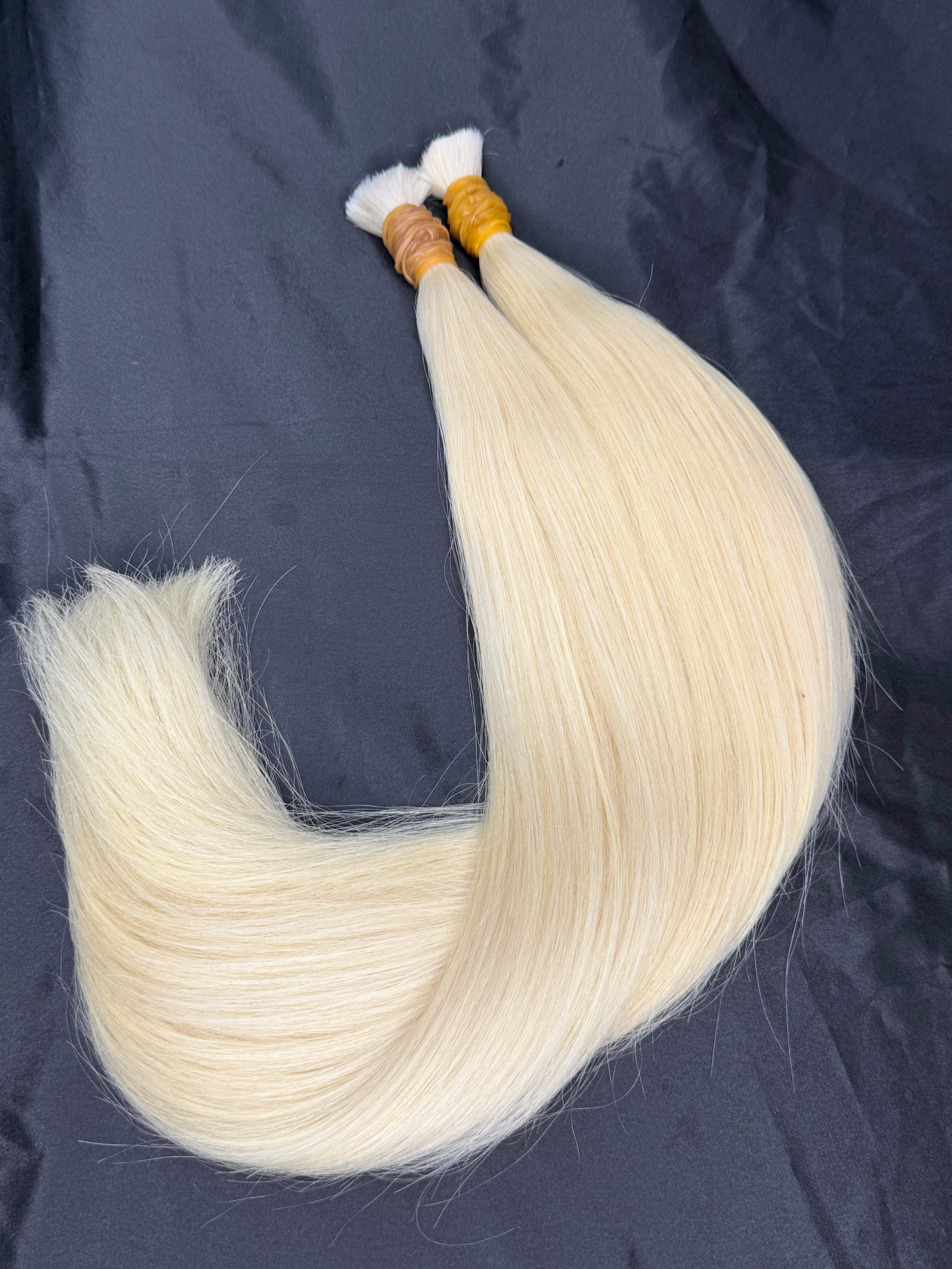 Ice blonde Weft hair extension